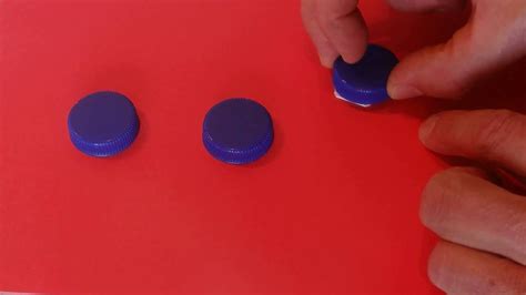 3 bottle cap trick|The Three Shell Game .